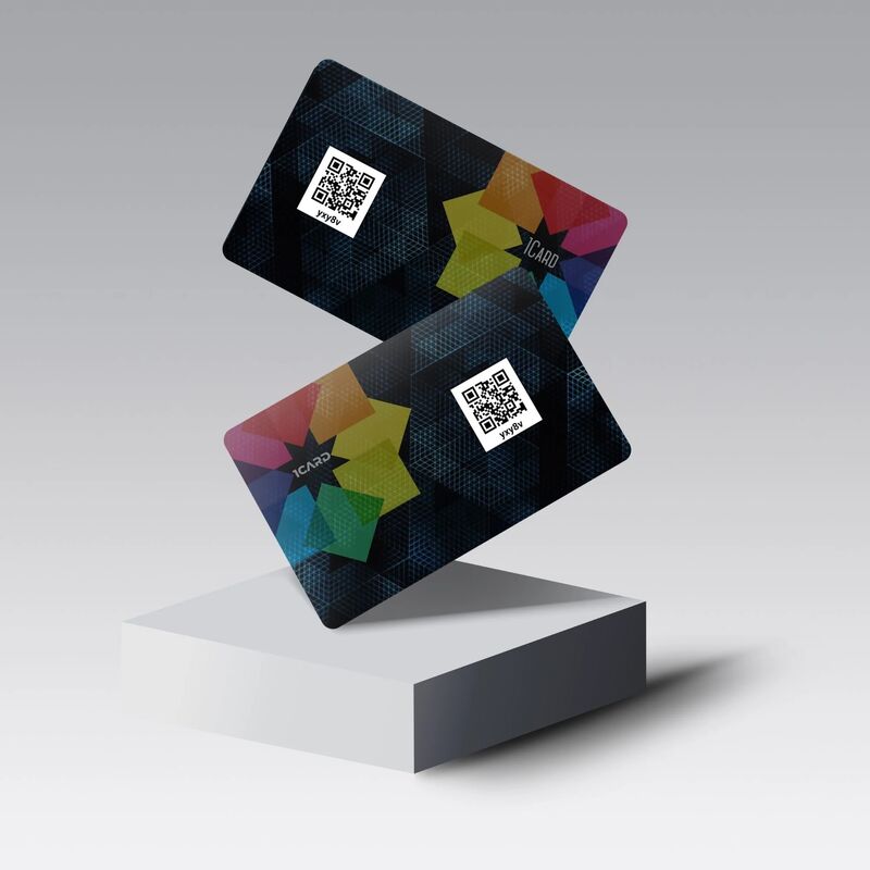 Two 1Card Duo cards with a QR code and a colourful star design